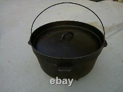American Camper Large Cast Iron Dutch Oven 14 Diameter x 5.5 Deep 3 Footed Lid