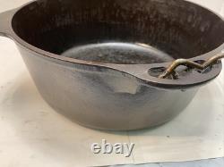 Griswold No. 8 Cast Iron Dutch Oven With Self Basting Lid