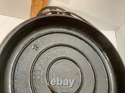 Griswold No. 8 Cast Iron Dutch Oven With Self Basting Lid