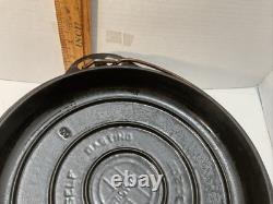 Griswold No. 8 Cast Iron Dutch Oven With Self Basting Lid