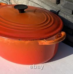 Le Creuset E Orange Flame Enamel Cast Iron Dutch Oven With Lid