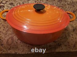Le Creuset Signature Cast Iron 6.75 Quart Oval Dutch Oven, Flame