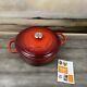 Le Creuset Signature Enameled Cast Iron Round Wide Dutch Oven 6 3/4-qt. Red Read
