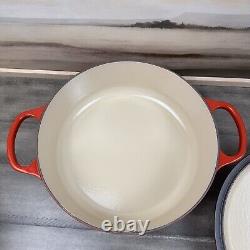 Le Creuset Signature Enameled Cast Iron Round Wide Dutch Oven 6 3/4-Qt. Red Read