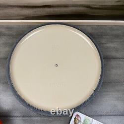 Le Creuset Signature Enameled Cast Iron Round Wide Dutch Oven 6 3/4-Qt. Red Read