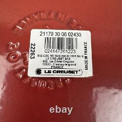 Le Creuset Signature Enameled Cast Iron Round Wide Dutch Oven 6 3/4-Qt. Red Read
