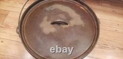 Vintage Lodge Large Cast Iron Dutch Oven Pot 14 C O with Lid 14 Inch 3 Leg
