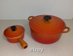 Cocotte Vintage Le Creuset n°14 en émail orange flamme et pot à sauce avec couvercle