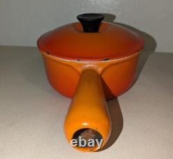 Cocotte Vintage Le Creuset n°14 en émail orange flamme et pot à sauce avec couvercle