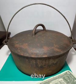 Cocotte en fonte Griswold Erie avec logo incliné No. 9 et couvercle 2552