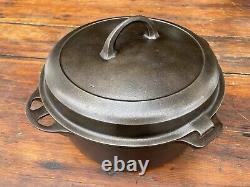 Cocotte en fonte Griswold avec couvercle à charnière assorti