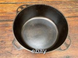 Cocotte en fonte Griswold avec couvercle à charnière assorti