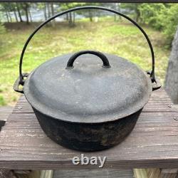 Cocotte en fonte vintage Griswold Erie n° 9 2552 avec couvercle et poignée bail. À réparer.