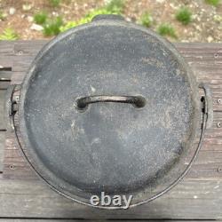 Cocotte en fonte vintage Griswold Erie n° 9 2552 avec couvercle et poignée bail. À réparer.
