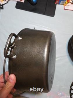 Fait en fonte Piqua Ware #8D, faitout néerlandais, trépied, couvercle avec logo souriant pot à haricots préféré