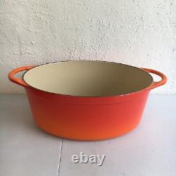 LE CREUSET ENAMELED CAST IRON Orange Red OVAL FLAME DUTCH OVEN & GRILL LID #32
<br/>
 <br/>Traduction en français : COCOTTE OVALE EN FER ÉMAILLÉ LE CREUSET Orange Rouge & COUVERCLE GRILL #32