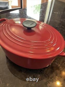 Le Creuset Cocotte ovale rouge de 5 litres #29 en excellent état d'occasion à peine utilisé