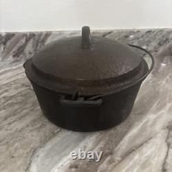 Pot en fonte émaillée non marquée pour camping avec couvercle