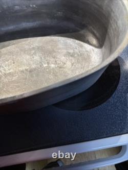 Ustensiles de cuisine Vintage Guardian Service : rôtissoire ovale, cocotte en fonte avec couvercle et dessous-de-plat