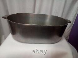 VTG Wagner Ware Magnalite #4269 17 QT Aluminium Roaster Lid Dutch Oven with Trivet		<br/>	 <br/>French Translation: Plat à rôtir en aluminium de 17 pintes avec couvercle et trépied VTG Wagner Ware Magnalite #4269