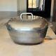 Vintage Wagner Ware Sidney O Magnalite 8qt 4265-p Roaster Dutch Oven With Lid Translates To "cocotte Rôtissoire Vintage Wagner Ware Sidney O Magnalite 8qt 4265-p Avec Couvercle" In French.
