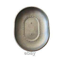 Vintage Wagner Ware Sidney O Magnalite 8qt 4265-P Roaster Dutch Oven With Lid translates to 'Cocotte rôtissoire vintage Wagner Ware Sidney O Magnalite 8qt 4265-P avec couvercle' in French.