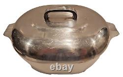 Wagner Ware Magnalite Sidney O 4265-P 8 Quart Roaster Dutch Oven With Lid<br/> 	<br/>Traduction en français: Cocotte rôtissoire de 8 litres Wagner Ware Magnalite Sidney O 4265-P avec couvercle