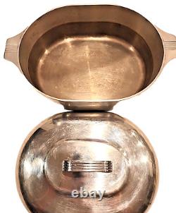 Wagner Ware Magnalite Sidney O 4265-P 8 Quart Roaster Dutch Oven With Lid<br/> 			
	  <br/> Traduction en français: Cocotte rôtissoire de 8 litres Wagner Ware Magnalite Sidney O 4265-P avec couvercle