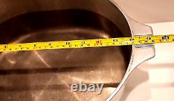 Wagner Ware Magnalite Sidney O 4265-P 8 Quart Roaster Dutch Oven With Lid<br/> 

 <br/> 	
Traduction en français: Cocotte rôtissoire de 8 litres Wagner Ware Magnalite Sidney O 4265-P avec couvercle