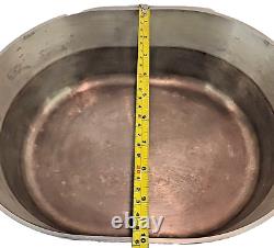 Wagner Ware Magnalite Sidney O 4265-P 8 Quart Roaster Dutch Oven With Lid <br/>	  <br/>Traduction en français: Cocotte rôtissoire de 8 litres Wagner Ware Magnalite Sidney O 4265-P avec couvercle
