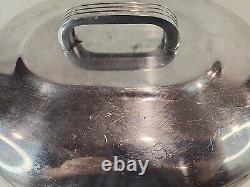 Wagner Ware Magnalite Sidney O 4265-P 8 Quart Roaster Dutch Oven With Lid<br/>
<br/>
Traduction en français: Cocotte rôtissoire de 8 litres Wagner Ware Magnalite Sidney O 4265-P avec couvercle